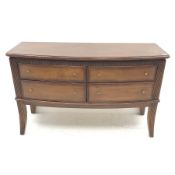 Regency style serpentine front mahogany sideboard, four graduating drawers, reeded outsplayed taperi