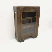 Early 20th century narrow oak bookcase display cabinet, single door enclosing two shelves, W77cm, H1