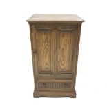 Ercol elm Golden Dawn finish pedestal cupboard, single door enclosing two shelves above single drawe