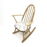 Ercol light beech rocking chair, spindle back, W62cm