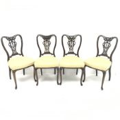 Set four late Victorian mahogany dining chairs, shaped, carved and pierced back, upholstered seat, c