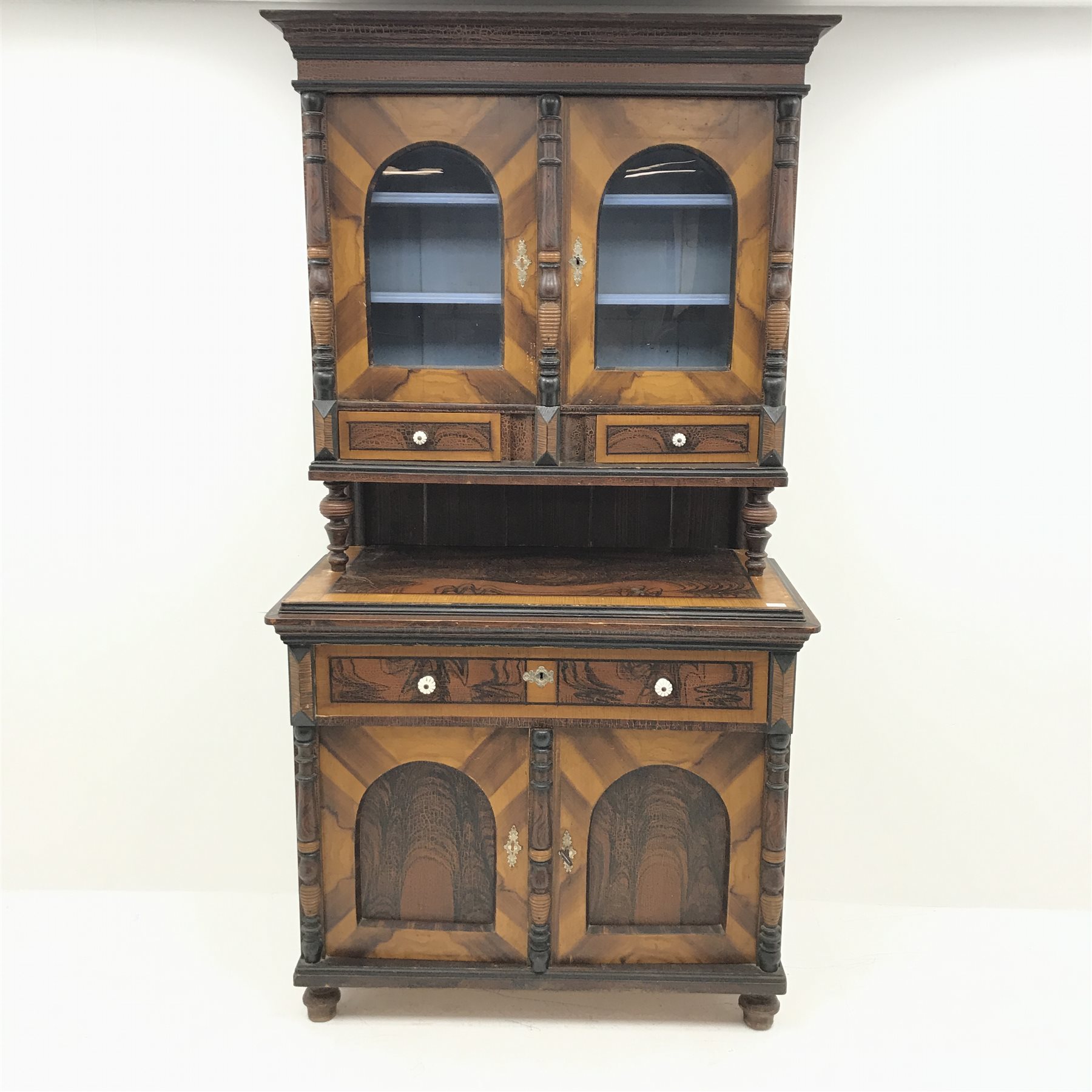 19th century scumbled pine continental side cabinet, shaped cresting rail, two glazed cupboards encl