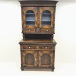 19th century scumbled pine continental side cabinet, shaped cresting rail, two glazed cupboards encl