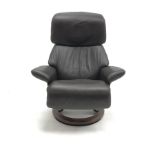 Stressless armchair upholstered in a chocolate leather, shaped support, (W81cm) and a Stressless Ell