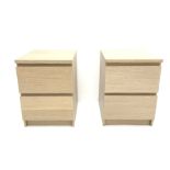 Pair Ikea light oak bedside chests, two drawers, plinth base, W41cm, H55cm, D49cm