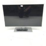 Panasonic TX-L32E6B (32�) television and remote control