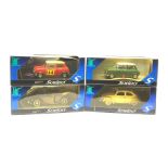 Four Solido Prestige large scale die-cast models comprising V.W. Coccinelle, V.W. Beetle, Mini Coope