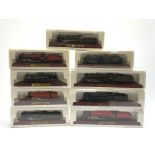 Nine static display models of steam locomotives, each on titled wooden base, in polystyrene boxes wi