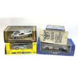 Four 1:18 scale die-cast models of racing cars comprising French Revell Ford GT-40 Le Mans 69, Revel