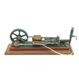 Scale built brass and steel model of a steam powered horizontal beam engine on mahogany base L41cm H