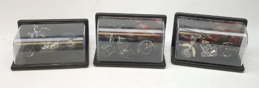 Three Franklin Mint die-cast models of Harley Davidson motorcycles comprising Blues Missile, Heritag