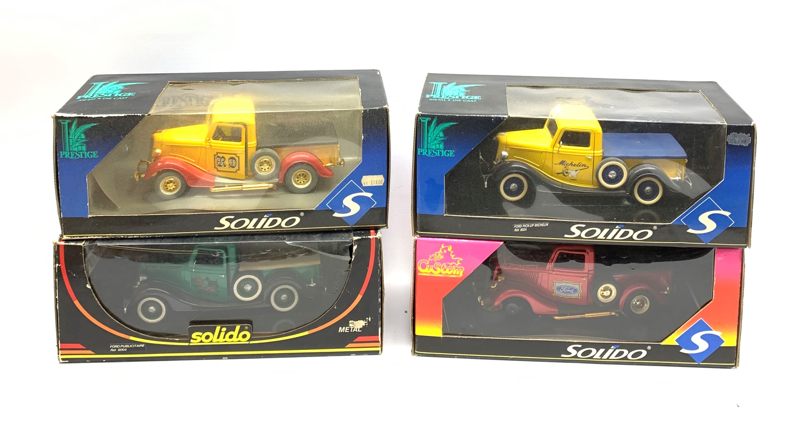 Four Solido Prestige/Custom die-cast models of Ford Pick-Up/Publicitaire trucks with various liverie