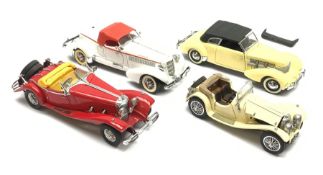 Four Franklin Mint die-cast model cars comprising 1935 Auburn 851 Speedster, 1937 Cord 812, 1935 Mer