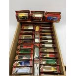 Thirty Matchbox Models of Yesteryear including promotional commercial vehicles, military ambulance,