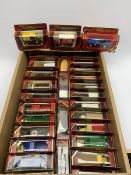 Thirty Matchbox Models of Yesteryear including promotional commercial vehicles, military ambulance,
