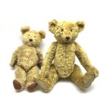 A 1950's plush covered teddy bear, with jointed limbs and glass eyes, together with an Atlantic Bear