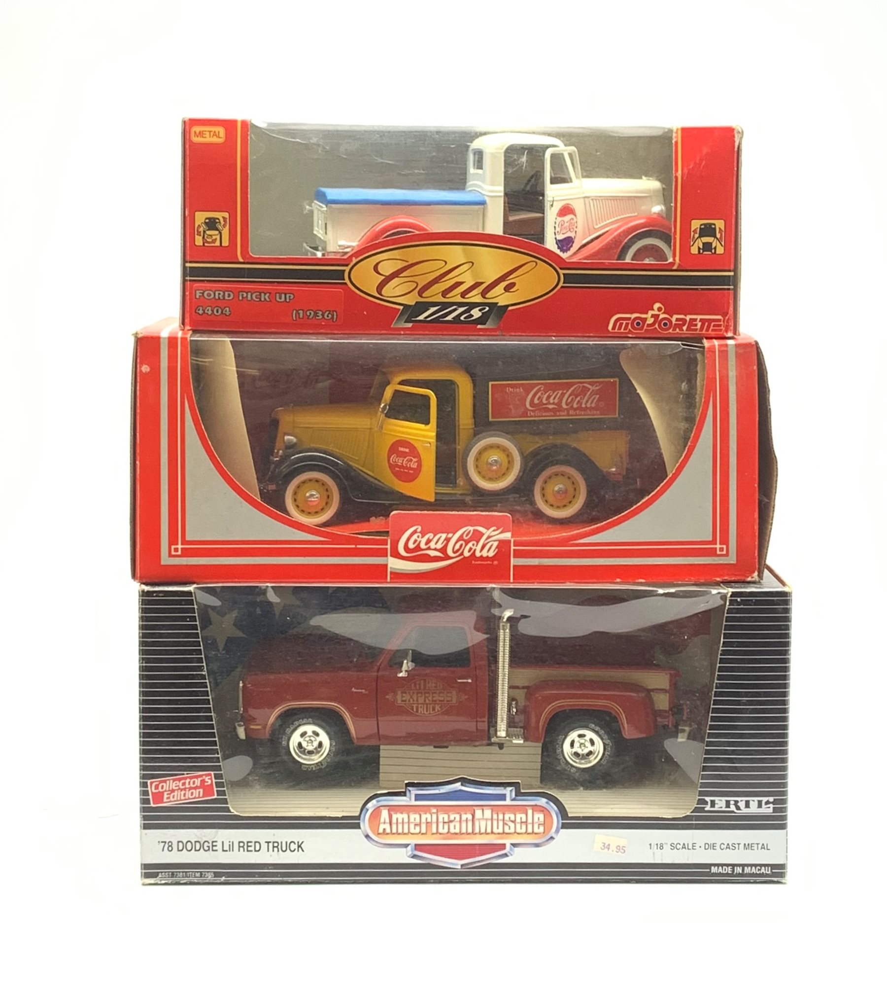 Three 1:18 scale die-cast trucks comprising Ertl American Muscle '78 Dodge Lil Red Truck, Majorette