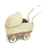 1950s Martin Holtappels plastic woven basketwork doll's pram with floral padded lining, retractable