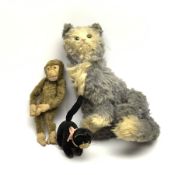 Steiff 'Fluffy' cat c1920s/30s in white and blue/grey mohair seated with tail curled around back leg