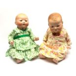 Two Armand Marseille Germany bisque head baby dolls, each with moulded hair, sleeping eyes, open mou