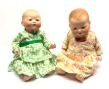 Two Armand Marseille Germany bisque head baby dolls, each with moulded hair, sleeping eyes, open mou