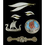 Norwegian silver and enamel Viking ship boat by Andresen & Scheinpflug, silver-gilt leaf brooch by N