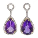 Pair of 18ct gold pear shaped amethyst pendant earrings, with diamond surround, amethyst total weigh