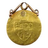 George III gold half spade guinea, with soldered gold mount