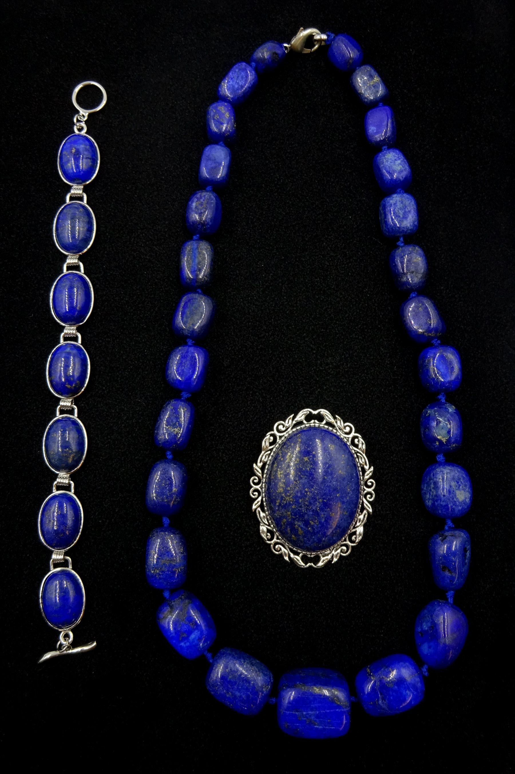 Lapis necklace, oval link bracelet and brooch