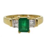 18ct gold emerald ring, with four baguette diamonds either side, hallmarked, emerald approx 0.80 car