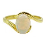 18ct gold oval opal ring, stamped 750