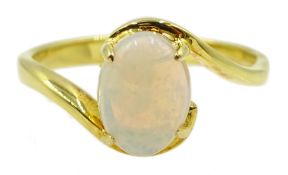 18ct gold oval opal ring, stamped 750