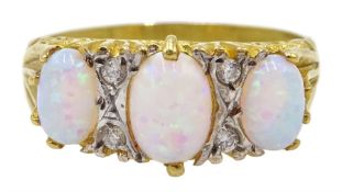 Silver-gilt three stone opal and cubic zirconia ring, stamped Sil