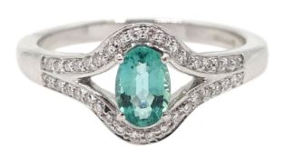 18ct white gold oval emerald and diamond ring, hallmarked, emerald approx 0.50 carat