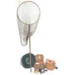 Fishing tackle including a landing net, two creels, fly tin, small brass reel, other reels, crab lin