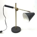 Brass and black finish adjustable desk lamp with cone shaped shade, on circular base, H72cm max