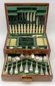 Mid 20th century matched canteen of silver-plated cutlery in oak case with lift up lid and fitted dr
