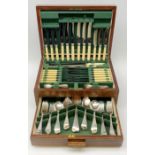 Mid 20th century matched canteen of silver-plated cutlery in oak case with lift up lid and fitted dr