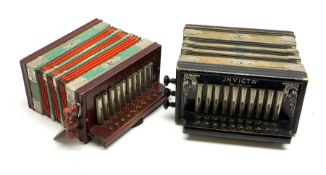 Czechoslovakian 'Invicta' accordion, the ebonised case with silvered decoration, thirteen buttons an