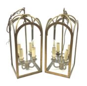 A pair of Victorian style brass hall lanterns, overall H49cm.