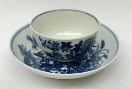 An 18th century Worcester porcelain half size tea bowl and saucer, each transfer print decorated in