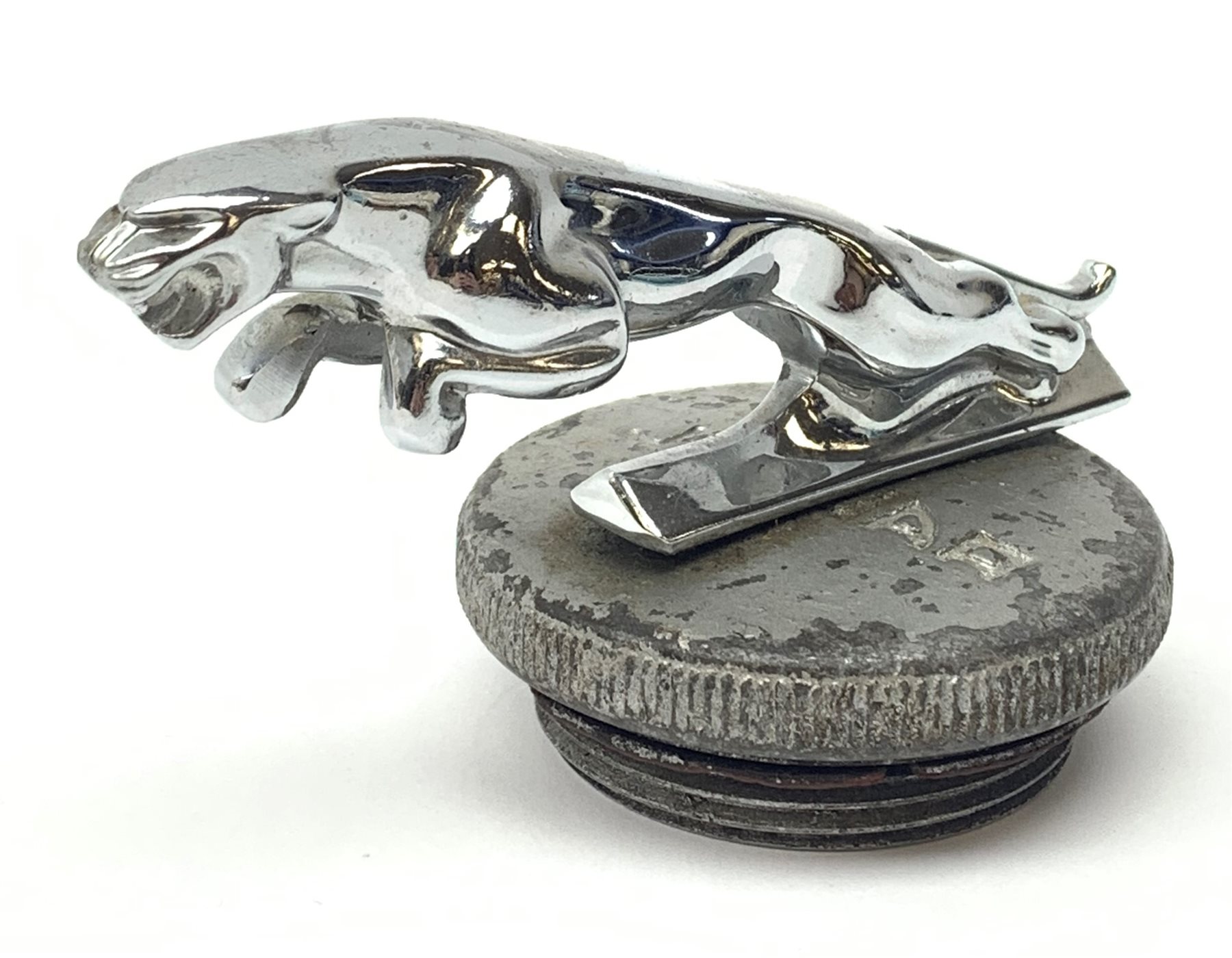 A chromed leaping Jaguar mascot, upon threaded cap, jaguar marked 7242653W, overall L13cm.