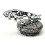 A chromed leaping Jaguar mascot, upon threaded cap, jaguar marked 7242653W, overall L13cm.