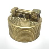 A Brilux Modele Depose Art Deco style brass table lighter, of cylindrical form with concentric ribbe