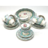 Royal Albert Enchantment tea service comprising of six teacups and saucers, two coffee cups and sauc