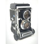 A Mamiya C33 Professional twin lens camera.
