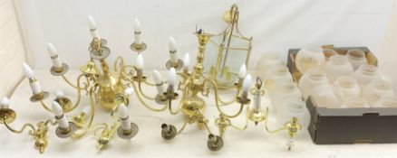 A Dutch style eight branch brassed chandelier, together with a set of four similar two branch wall s