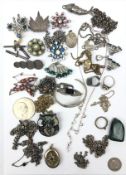 Silver stone set bangle, silver chains. vintage brooches and other costume jewellery