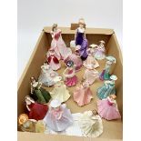 A group of nineteen Coalport figurines, comprising Ladies of Fashion Anastasia, Figurine of the year