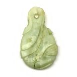 A carved Jade pendant, H7.5cm.